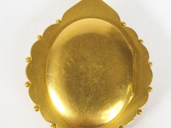 Pendentif porte-photo Napoléon III en or jaune, de forme ovale bords c