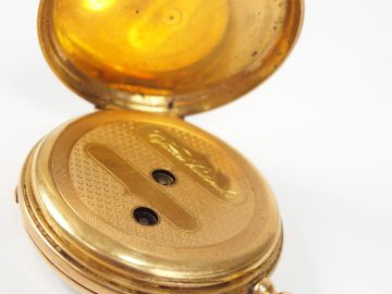 Montre de gousset en or jaune, cadran émail (fels), chiffres arabes et