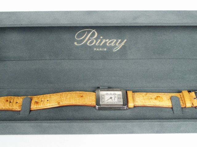 POIRAY, "Ma Première, Grand Modèle". Montre dame, cadran acier à décor