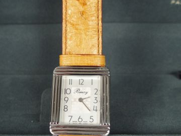 POIRAY, "Ma Première, Grand Modèle". Montre dame, cadran acier à décor