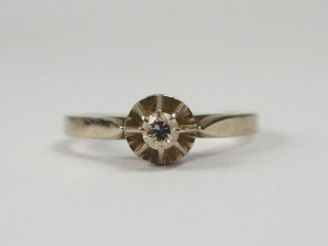 Vente aux enchères Solitaire monture or blanc ornée d'un diamant taille moderne de 0,10ct