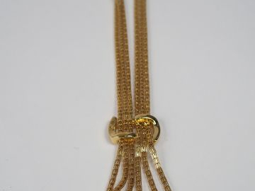 Sautoir fantaisie en métal doré maille tube et pendentif pavé de pierr