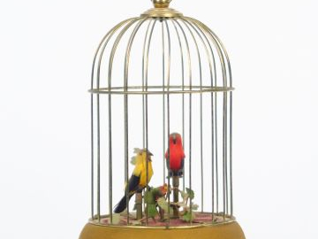 Boite à musique figurant une cage aux deux oiseaux  (mécanisme bloqué)