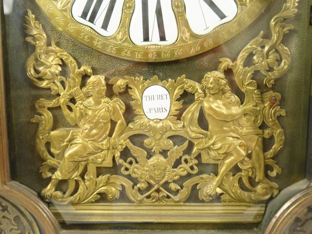 Cartel Napoléon III en marqueterie Boulle sur fond d'écaille. Cadran s
