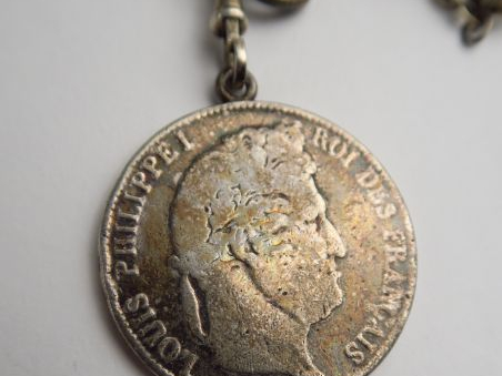 Pièce de 5 francs en argent, montée en pendentif, avec sa chaine. Poid