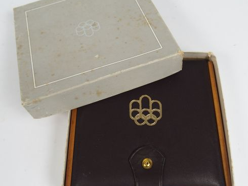 Coffret contenant 4 pièces argent des Jeux Olympiques de Montreal de 1