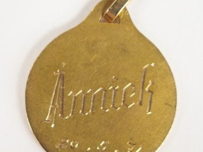 Médaille religieuse en or jaune, gravée Annick. Poids: 2gr