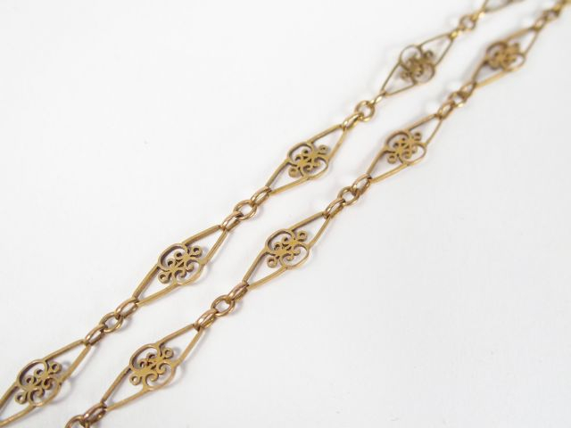 Collier en or jaune, maille filigrannée. 54cm Poids: 8gr