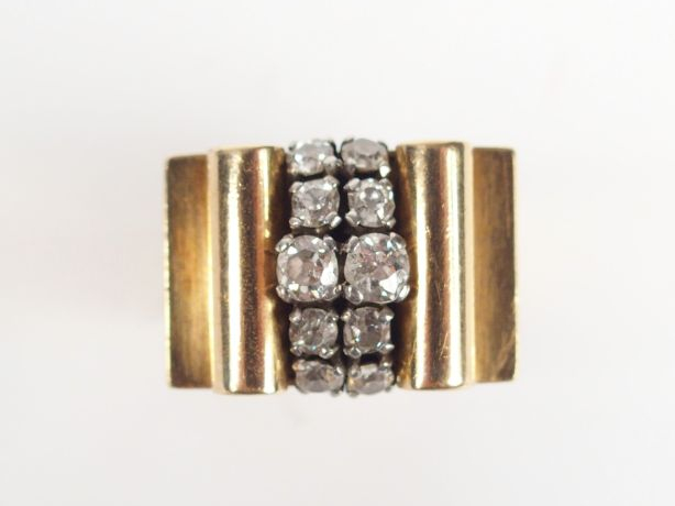 Bague 1940-1950 dite "pont" en or jaune, motif central en 2 lignes de 