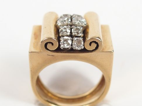 Bague 1940-1950 dite "pont" en or jaune, motif central en 2 lignes de 