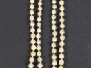 Collier de perles de culture disposées en chute sur un double rang, fe