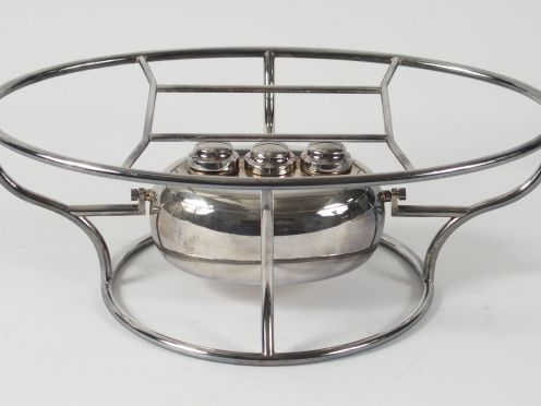 FELIX FRERES. Chauffe-plat de style Art Déco en métal argenté.