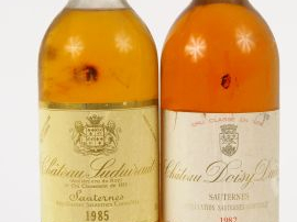 Vente aux enchères 2 BOUTEILLES SAUTERNES : 1 CHÂTEAU SUDUIRAUT 1985 HEP - 1 CHÂTEAU DOIS