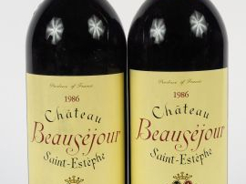 Vente aux enchères 2 BOUTEILLES CHÂTEAU BEAUSEJOUR CB ST ESTEPHE - 1986 - 1 BG/1 LB