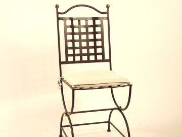 Mobilier de salle à manger en fer forgé et verre comprenant : Une tabl