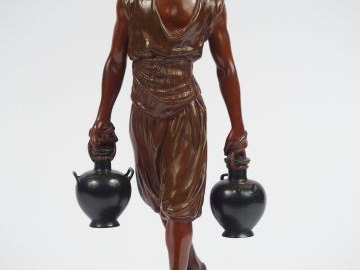DEBUT "Le porteur d'eau". Sculpture en bronze à patine médaille. Signé