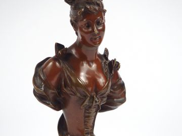 V. BRUGNEEL. "Jeune femme en buste". Sculpture en bronze patiné , vers