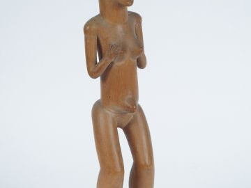 Statue Punu, Gabon. Bois à patine blonde. H : 42,5 cm Expert : Emmanue
