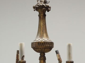 Lustre de style Louis XVI en bronze doré, éclairant à 4 lumières. H. :