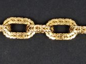 Vente aux enchères Bracelet en or jaune, maillons gravés à décor de feuillage.  20 cm  Po