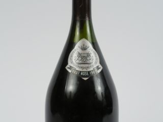 Vente aux enchères 1 BOUTEILLE CHAMPAGNE DOM RUINART ROSE - 1969 - 3 CM SOUS LA COIFFE