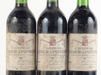 Vente aux enchères 3 BOUTEILLES CHÂTEAU LATOUR A POMEROL - 1982 - E POUSSIEREUSES