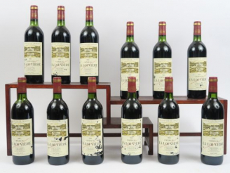 Vente aux enchères 12 BOUTEILLES CHÂTEAU LA LOUVIERE GRAVES - 1982 - CBO