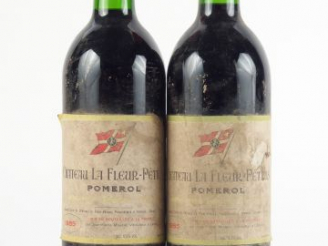 Vente aux enchères 2 BOUTEILLES CHÂTEAU LA FLEUR PETRUS POMEROL - 1985 - E POUSSIEREUSES/