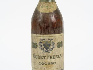 Vente aux enchères 1 TRES VIEILLE BOUTEILLE COGNAC GODET FRERES - CAPS LEGER CORRODEE