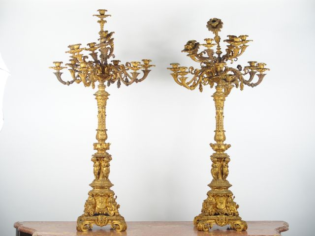 Paire de candélabres Napoléon III en bronze doré, à décor de quatre év