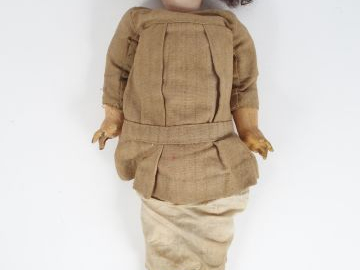 Poupée tête porcelaine en état d'usage, manque les yeux, corps articul