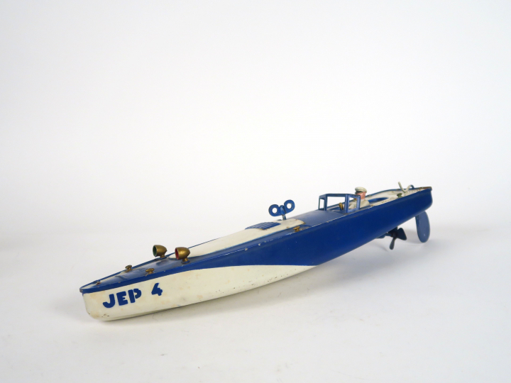 Canot JEP n° 4 ruban bleu, bel état, avec pilote, fonctionnant. Bleu e