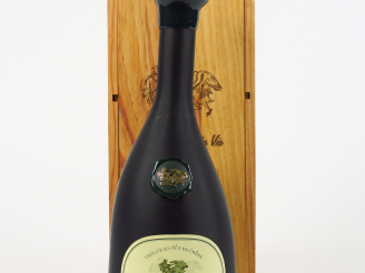 Vente aux enchères 1 BOUTEILLE VIEILLE EAU DE VIE DE PRUNE CHÂTEAU DE LAUBADE 42° - COFFR