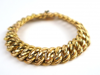 Vente aux enchères Bracelet maille américaine en or. Poids : 21,13 g