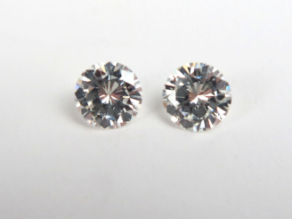 Vente aux enchères 2 diamants sur papier de 0,61 carat chacun, (I, VS1 et H, VS2)  (ref. 
