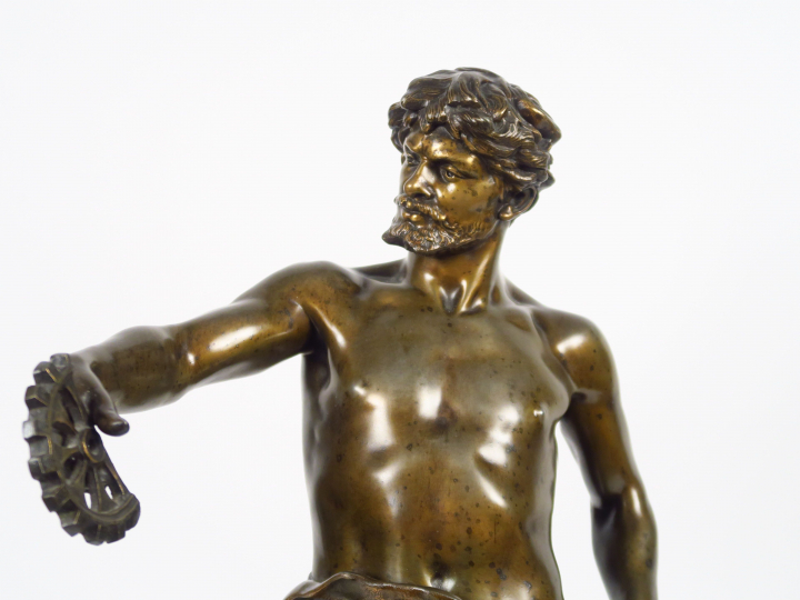 C. MARIOTTON "Le travail" Sculpture en régule, socle en marbre vert.  