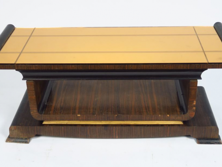 FAURE.  Table basse en placage d'ébène de macassar et bois noirci.  De