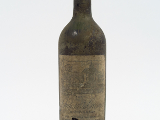Vente aux enchères 1 BOUTEILLE CHÂTEAU DES CARMES HAUT BRION GRAVES - 1917 - MEP/CAPS CIR