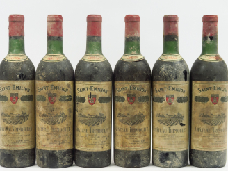 Vente aux enchères 6 BOUTEILLES CHÂTEAU TRIMOULET GCC ST EMILION - 1955 - 4 LB/2 HEP/BS