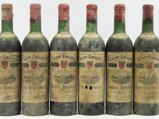 Vente aux enchères 6 BOUTEILLES CHÂTEAU TRIMOULET GCC ST EMILION - 1955 - 1 HEP/1 MEP/4 B
