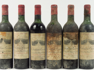 Vente aux enchères 6 BOUTEILLES CHÂTEAU CANON 1er GCC ST EMILION - 1957 - 1 LB/2 HEP/3 ME