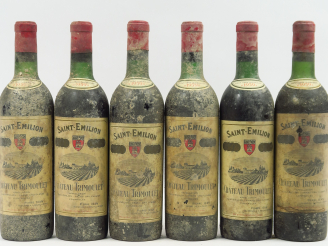 Vente aux enchères 6 BOUTEILLES CHÂTEAU TRIMOULET GCC ST EMILION - 1959 - 4 BG/2 LB/BS