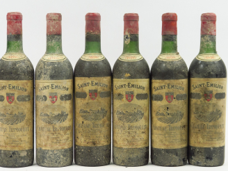 Vente aux enchères 6 BOUTEILLES CHÂTEAU TRIMOULET GCC ST EMILION - 1959 - 1 BG/2 LB-HEP/1