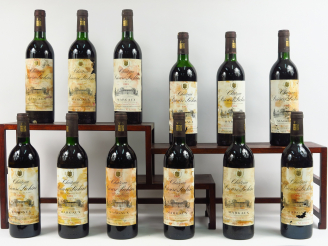 Vente aux enchères 12 BOUTEILLES CHÂTEAU PRIEURE LICHINE MARGAUX - 1985 - CBO - 6 BG/5 LB