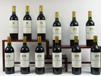 Vente aux enchères 12 BOUTEILLES CHÂTEAU HAUT BATAILLEY GCC PAUILLAC - 1988 - CBO - 11 BG