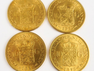Vente aux enchères 4 pièces étrangères en or