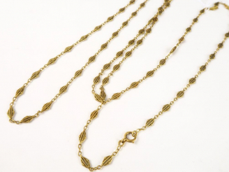 Vente aux enchères Grande giletière en or. Poids : 69,8 g