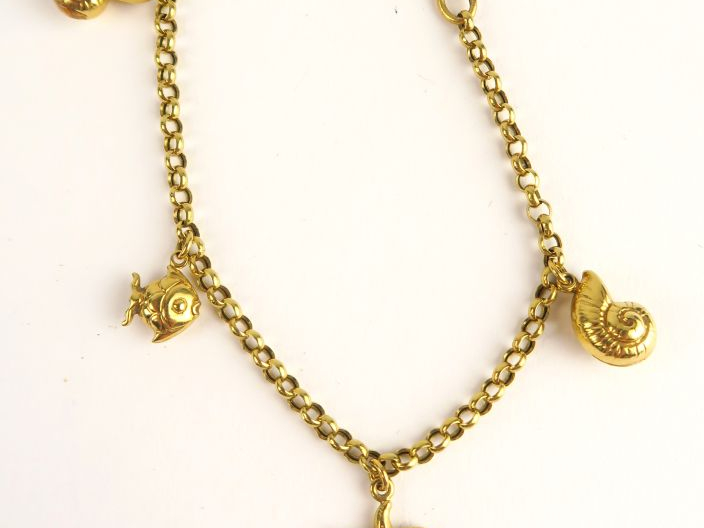 Bracelet en or, pendeloques sur le thème de la mer. Poids : 5,9 g