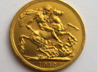Vente aux enchères 1 souverain Georges V en or. 1912