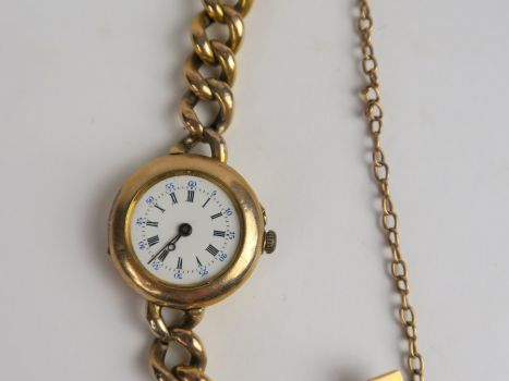 Bracelet gourmette or et montre de col or (mariage de raison). Poids t